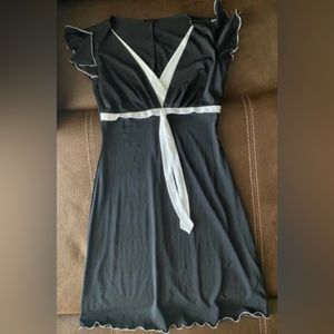 8- Black Dress with white trimming, mid thigh